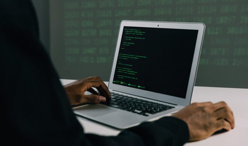 Free Person Using Macbook Air Stock Photo