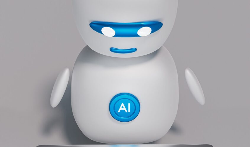 a white robot sitting on top of a table