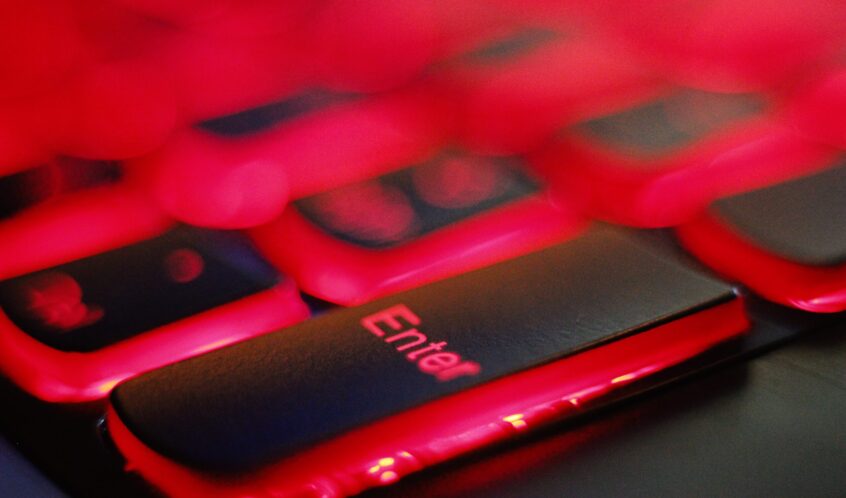 a close up of a red and black keyboard