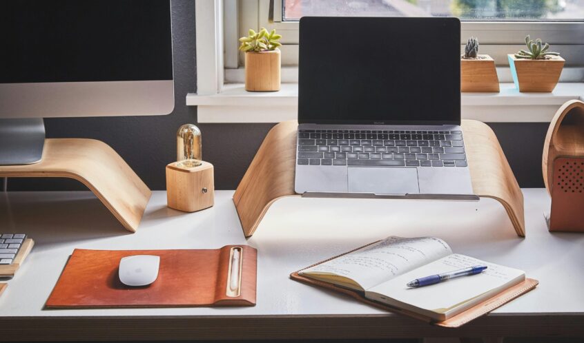 Free A stylish and contemporary home office setup with laptop and desk accessories. Stock Photo